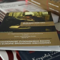 Okładka broszury konferencyjnej.